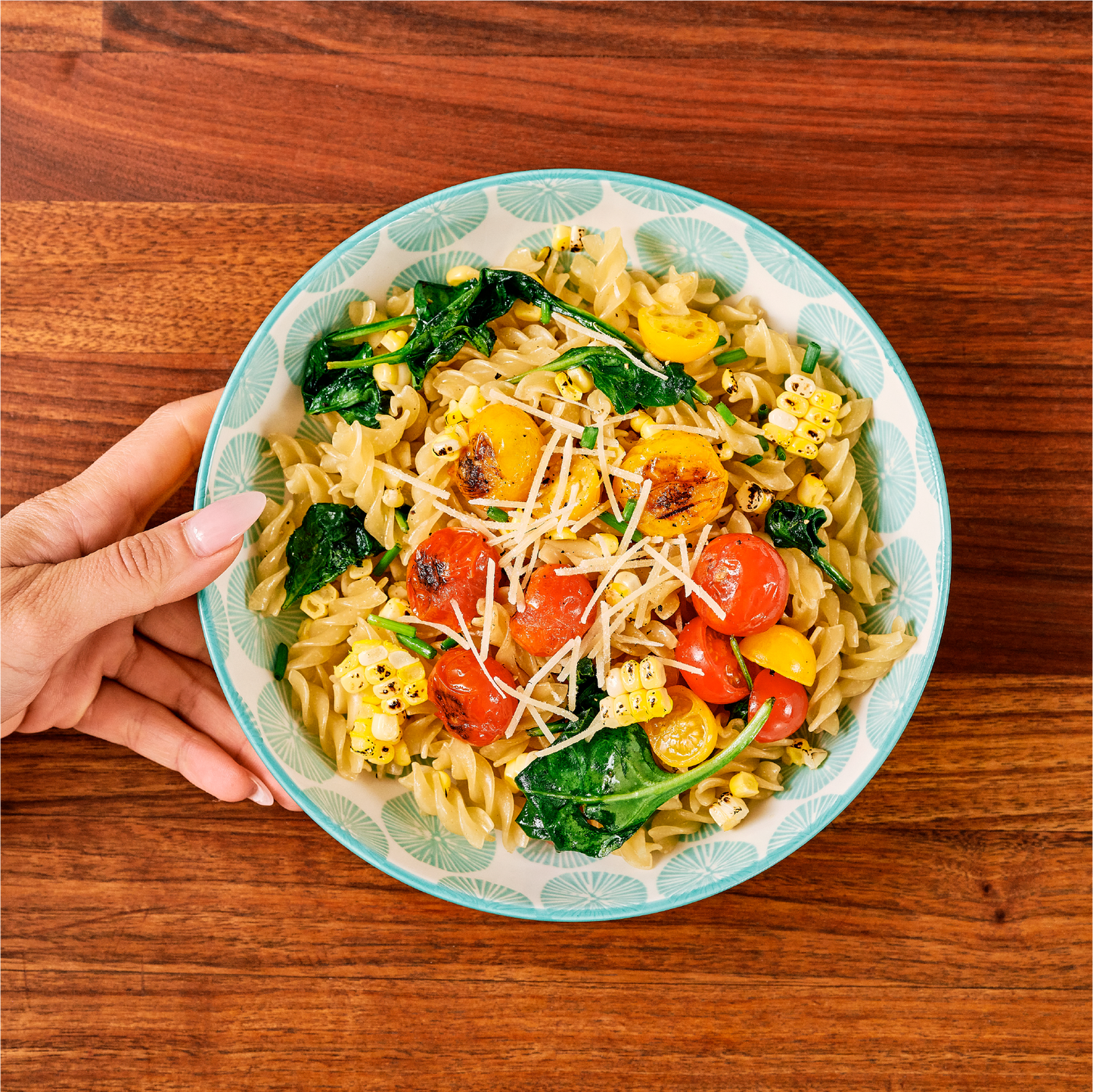 High fiber rotini pasta from Carbe Diem plated on table, overhead view