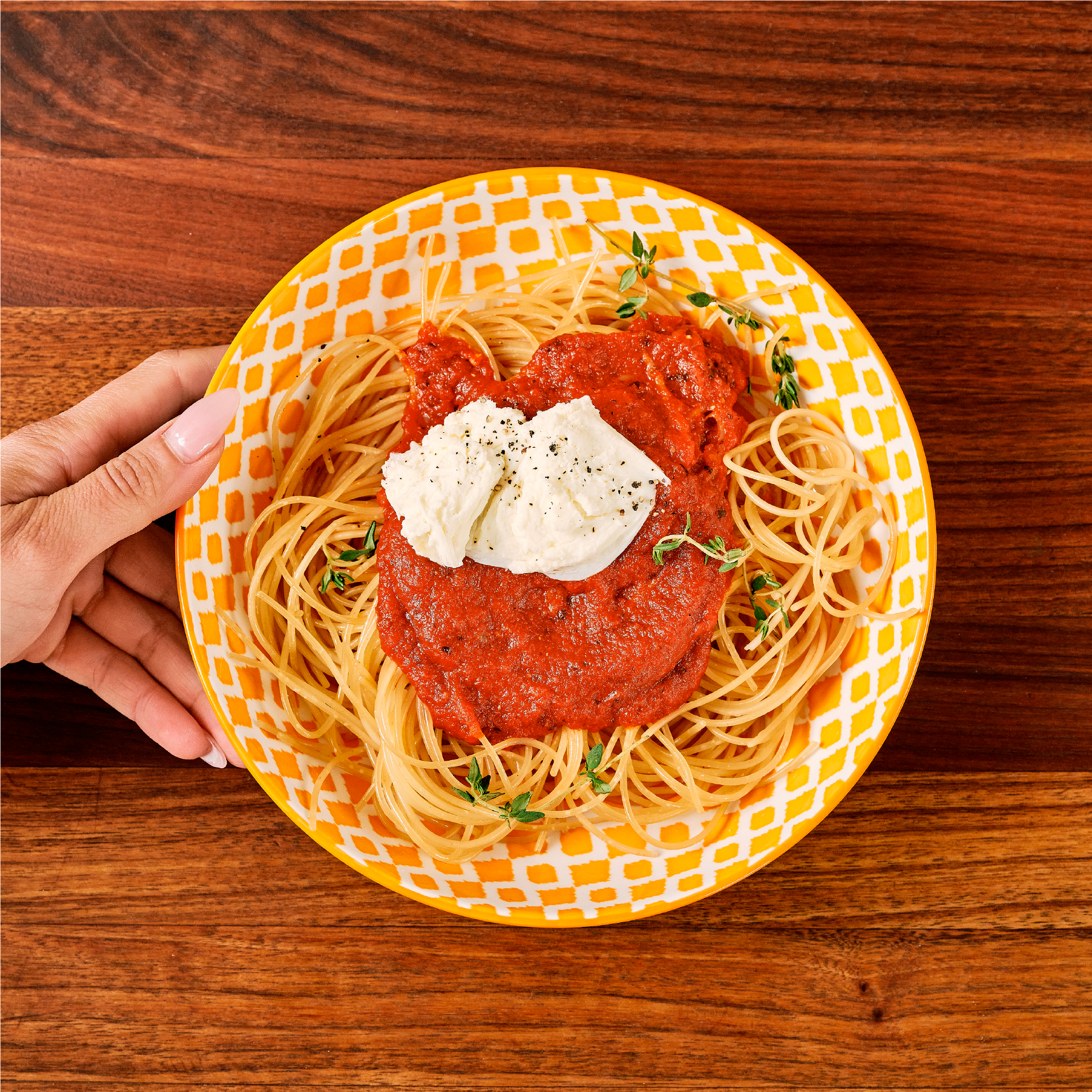 High fiber spaghetti plated on table, overhead view