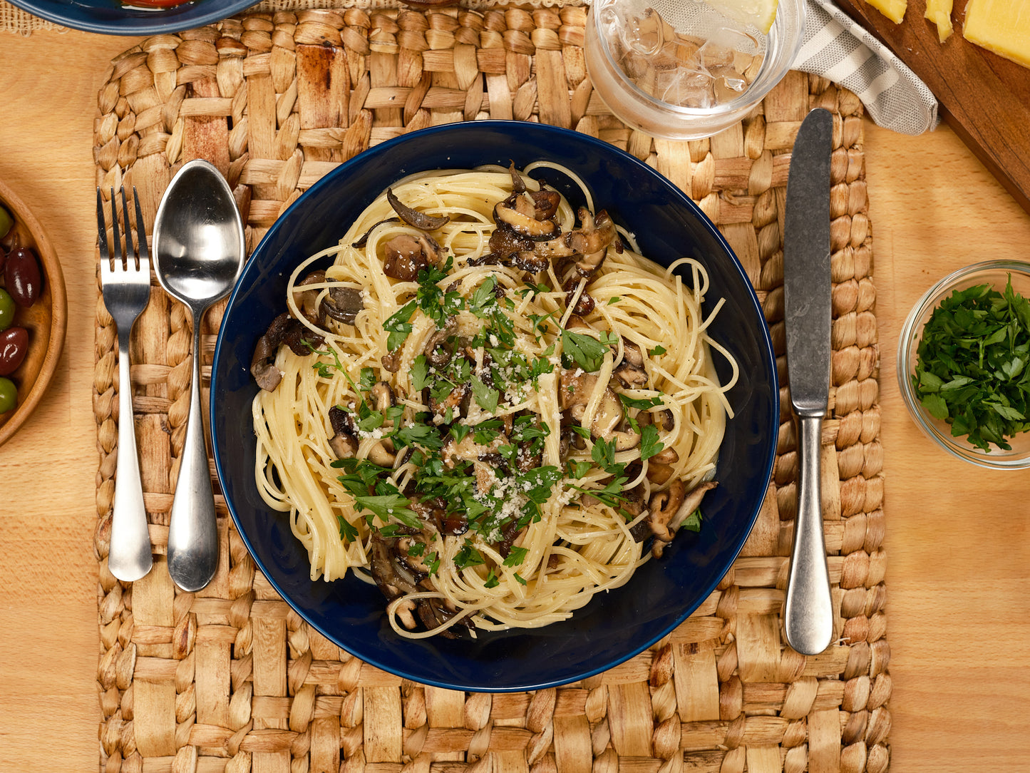 Reduced calorie spaghetti plated on table, overhead view