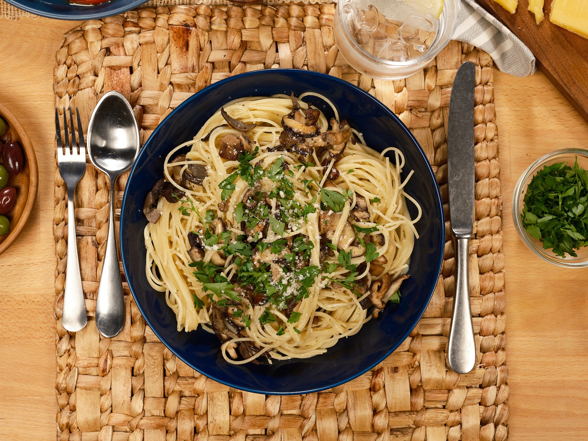 Reduced calorie spaghetti plated on table, overhead view