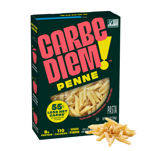 Front of Carbe Diem Penne box with a pile of penne noodles in front.