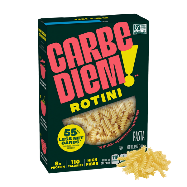 Front of Carbe Diem Rotini box with a pile of rotini noodles in front.