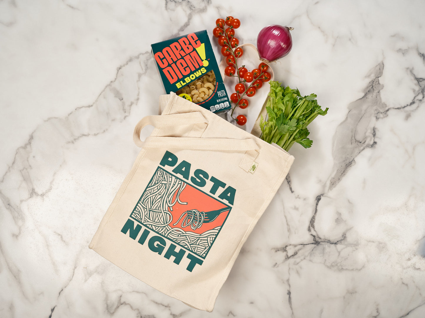 Cream-colored canvas tote bag with image of spaghetti. Reads "Pasta Night"
