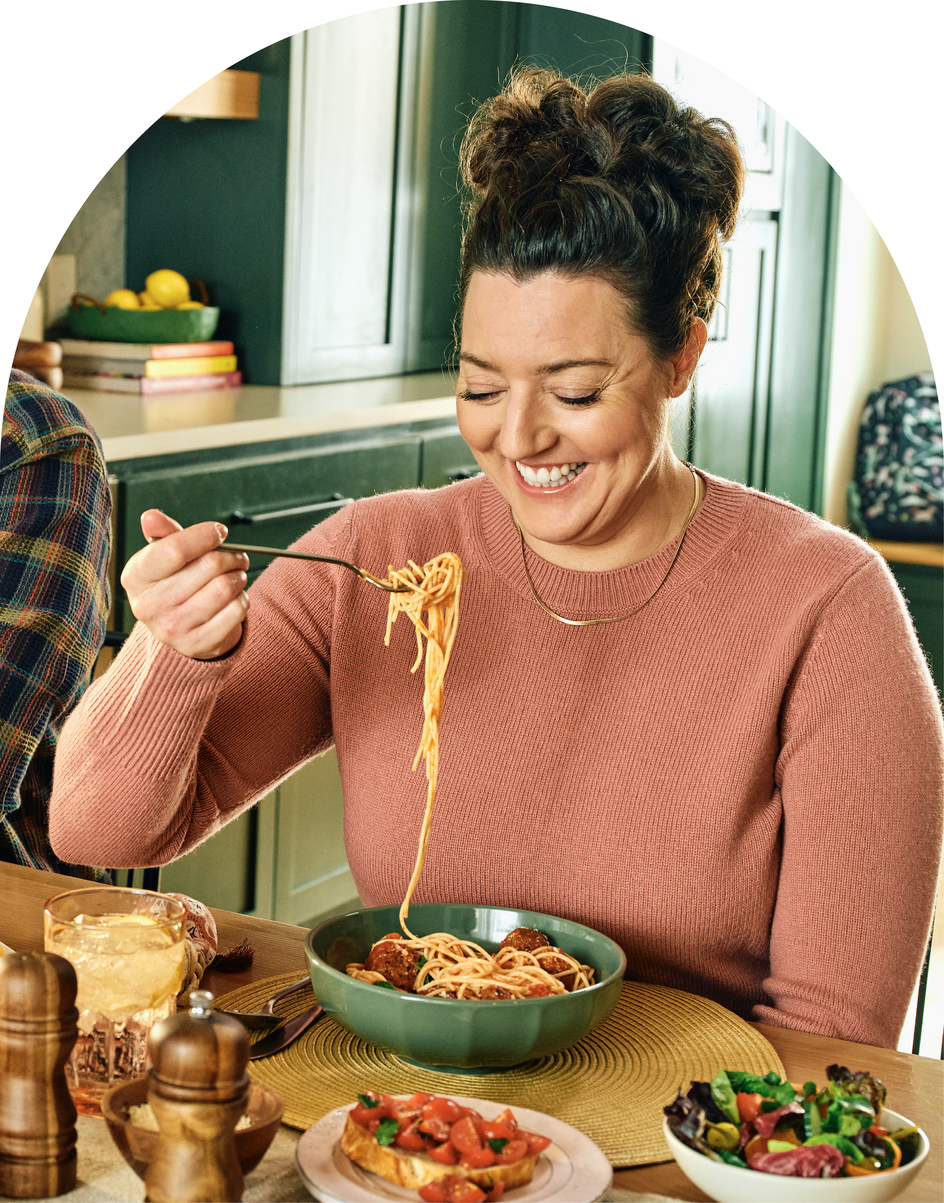 woman eating pasta