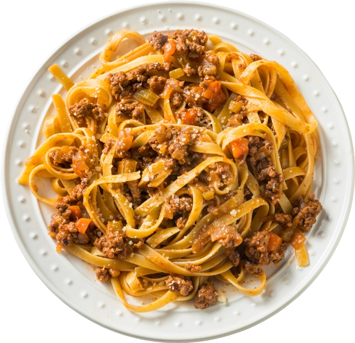 Pasta dish with ground meat and vegetables on a white plate
